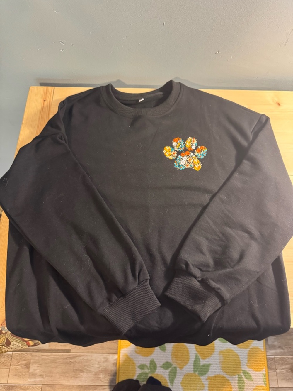 Black Crewneck Sweater with Colorful Floral Paw Embroidery